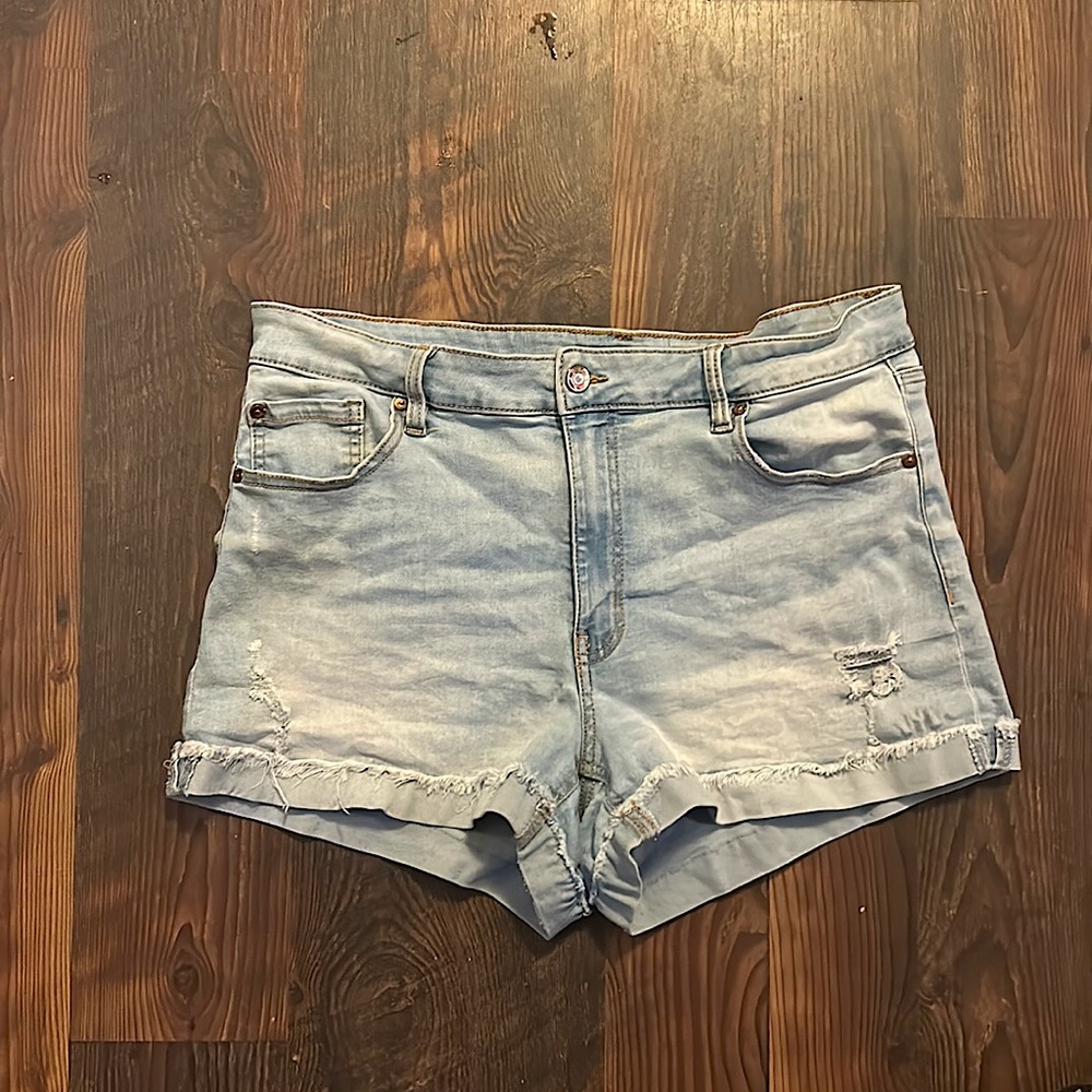 Light wash jean shorts.